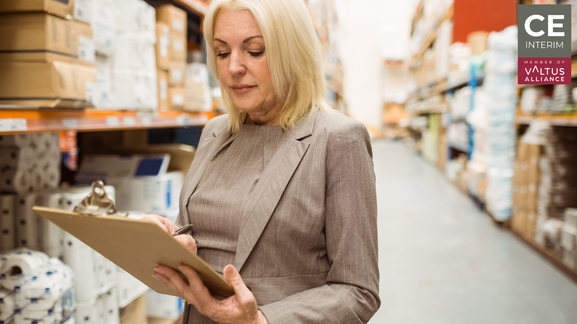 executive discreetly reviewing physical inventory inside a Czech manufacturing plant